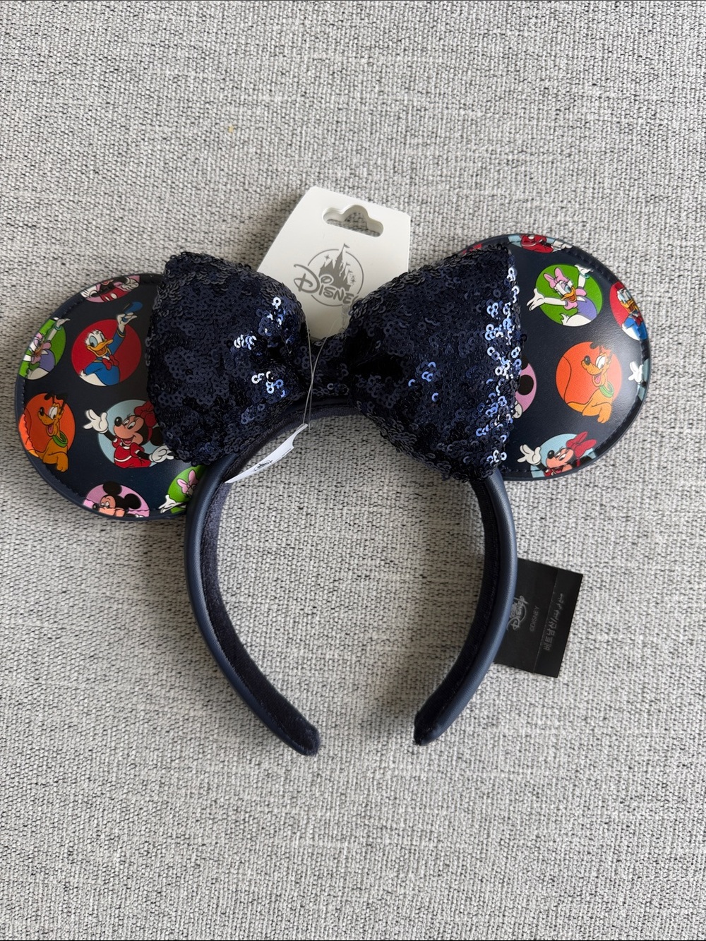 Disney Navy Sequin Bow Minnie Ear Headband with Character Print Ears